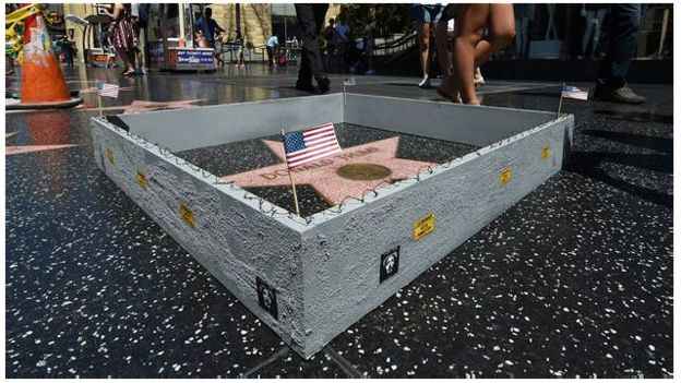 هنرمند آمریکایی دور ستاره ترامپ دیوار کشید